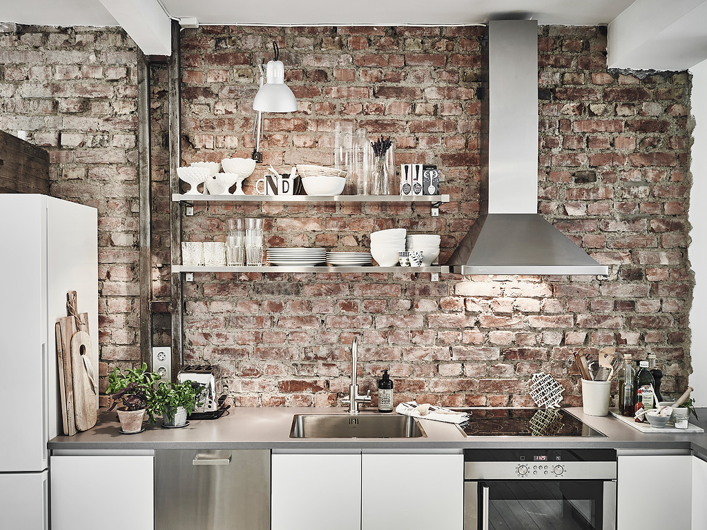 Alexej & Lenore Scandinavian-kitchen-with-brick-wall-and-shelves