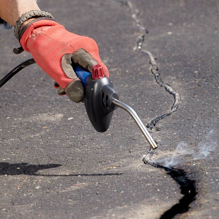 How to Repair Cracks in Your Asphalt Driveway » Residence ...