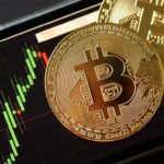 Bitcoin gold coin and chart background. Virtual cryptocurrency concept.