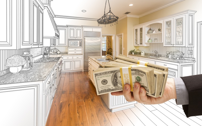 Hand Handing Cash Over Kitchen Design Drawing and Photo Combination