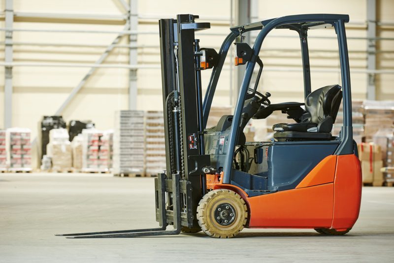 forklift loader stacker truck at warehouse