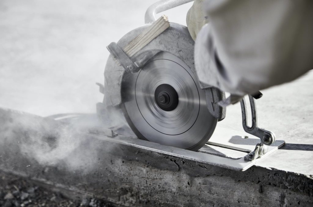 Man cutting a Concrete Slab