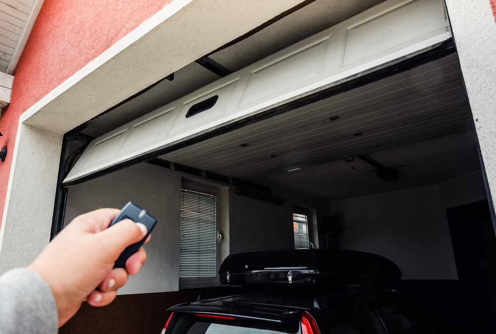 Garage door PVC. Hand use remote controller for closing and open