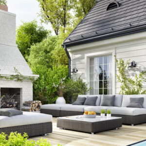 Cozy patio area with garden furniture, swimming pool and outdoor