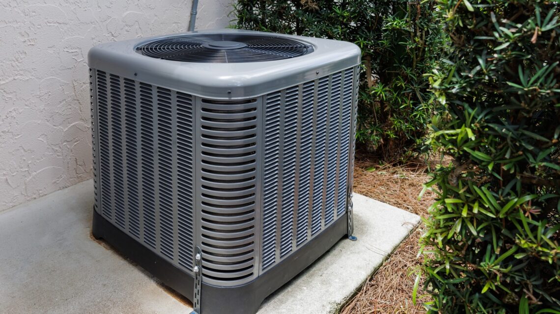 Modern,Hvac,Air,Conditioner,Unit,On,Concrete,Slab,Outside,Of