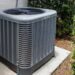 Modern,Hvac,Air,Conditioner,Unit,On,Concrete,Slab,Outside,Of