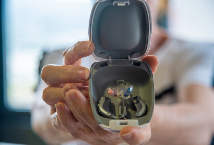 Holding and placing Hearing aids